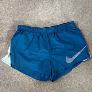 Nike Women's Blue workout shorts (M)